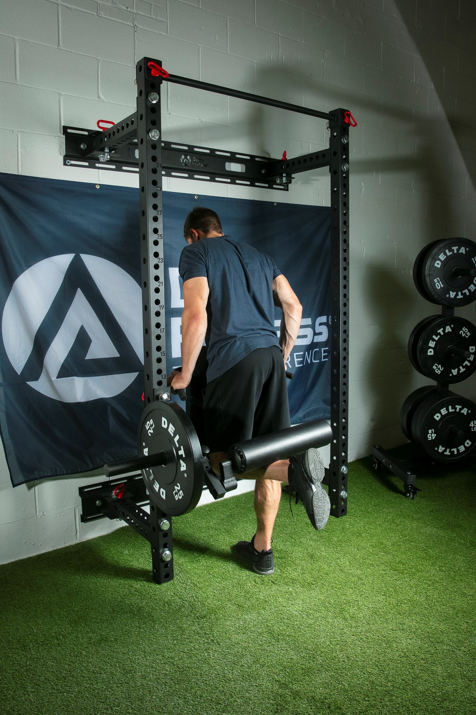 Plate-Loaded Leg Curl and Extension Rack Attachment